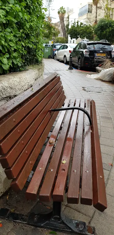 snail sitting on a bench in Tel Aviv